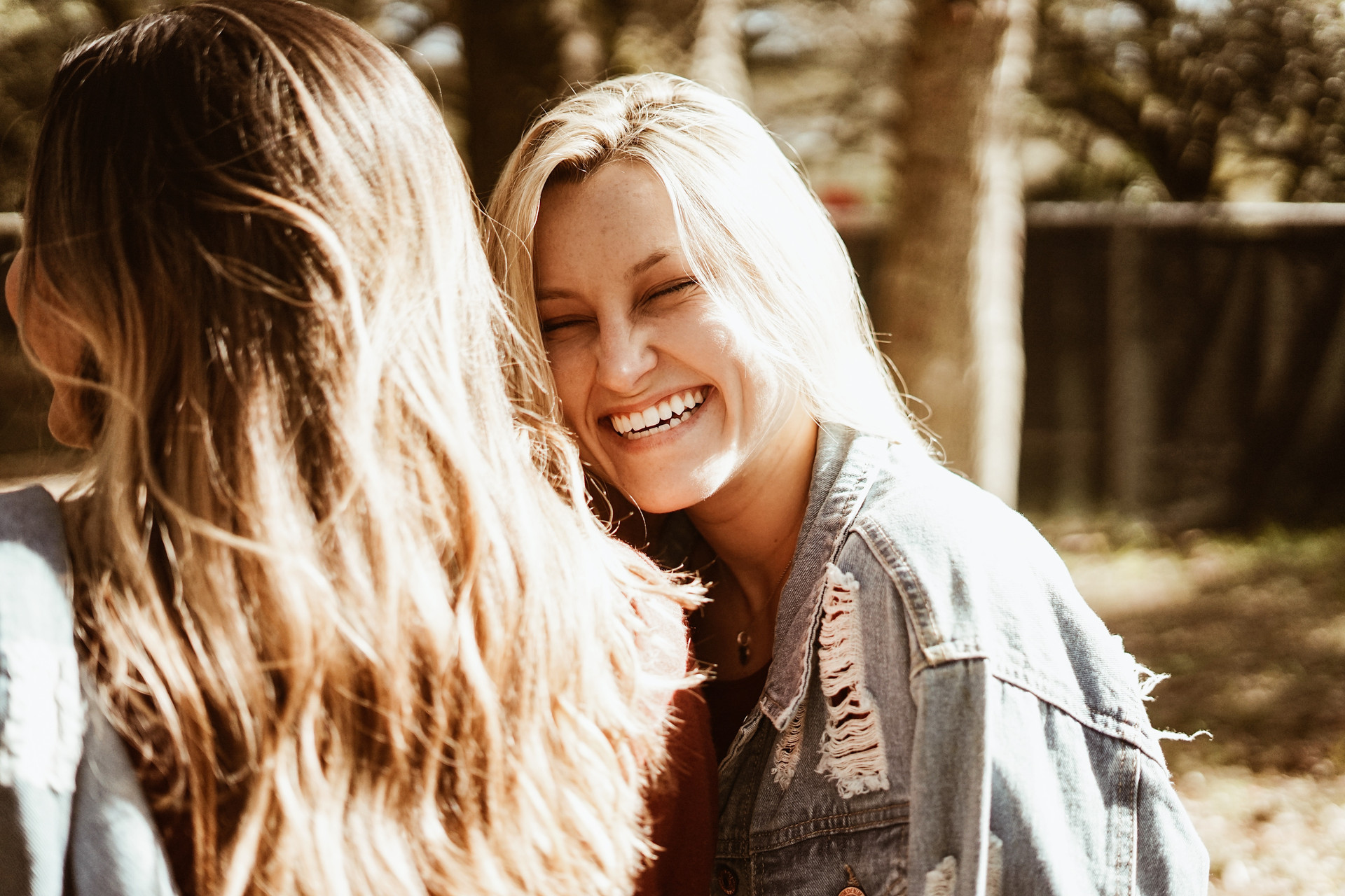 Woman smiling at girl