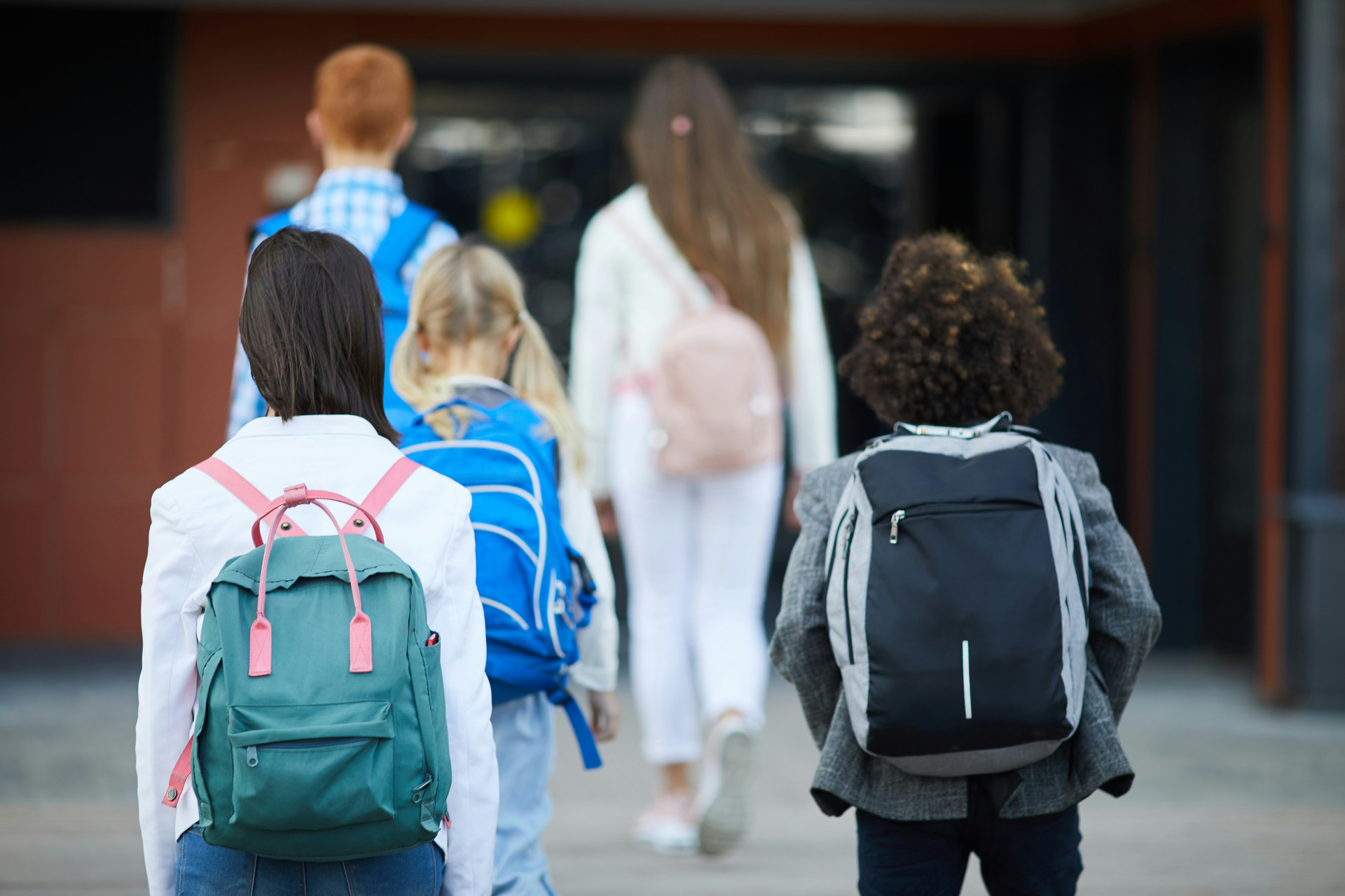 Students entering school building