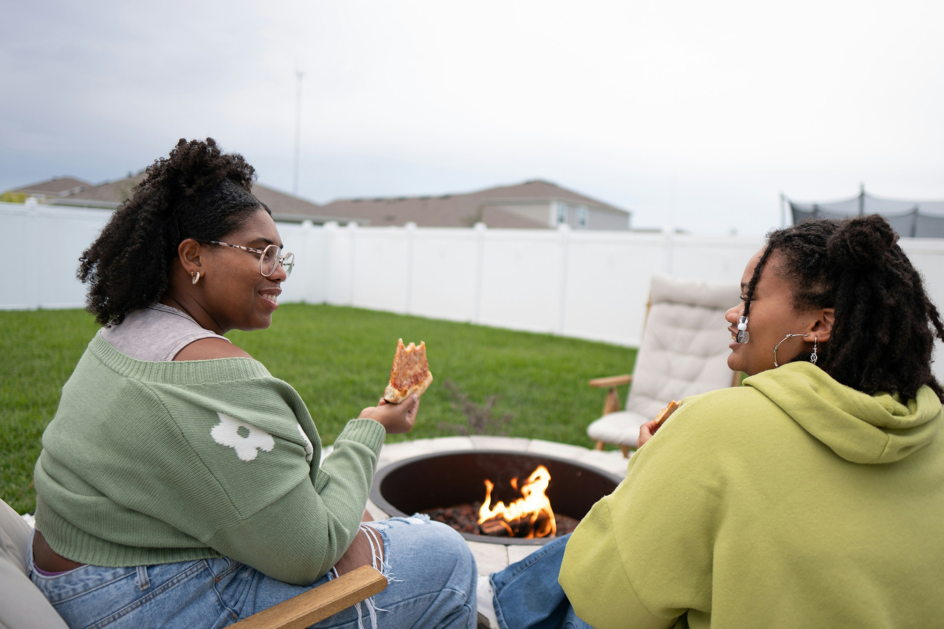Students gathered around fire place